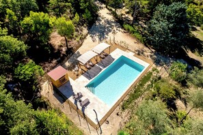 2025 brand new pool with shaded areas, sun lounges and fully equipped pool Bar