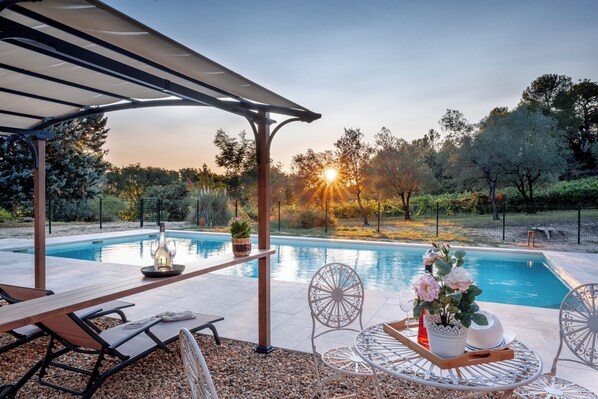 Whispers of the Vines. 
Sunset at the pool Bar