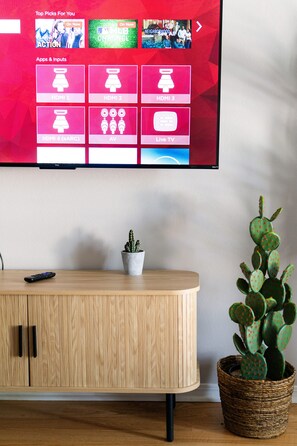 Kick back and enjoy endless entertainment with a Smart TV and plenty of options to watch – your perfect movie night awaits!