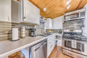Kitchen | 2-Story Studio | Mini-Split A/C | Keyless Entry | In-Unit Laundry