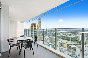 Enjoy your morning coffee in our spacious balcony overlooking the river/the city