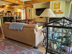Living room/sofa sleeper.  Lock out wall is open with view from guest bedroom.
