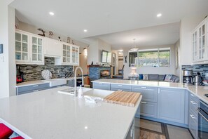 Dining area is located behind the kitchen.