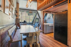 Dining area is to the left side of the kitchen when entering suite.