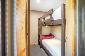 Includes 2 bunk beds. All of which are twin sized. The other Bunk bed is to the left of the room.