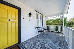 Property Entrance + Seating Area