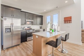 Modern kitchen with new appliances.