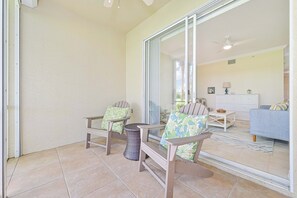 SB813 - The screened in patio offers a beautiful view overlooking the Green