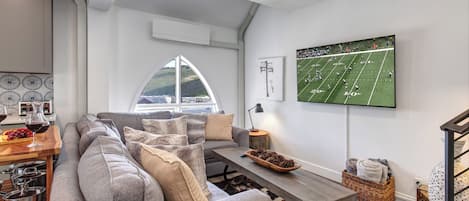 Blue Church Lodge C offers a stylish, cozy living room with flat screen TV.