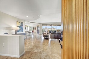 Front door entrance to a light and bright open floor plan