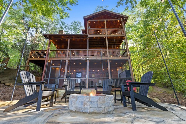 Take in the sights and sounds of nature with 3 covered decks and a beautiful new fire pit