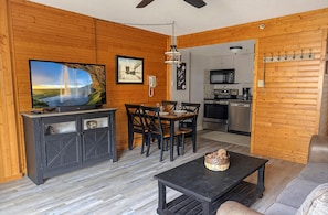 Kick back with your group in the comfortable living room and enjoy the 50" smart TV.