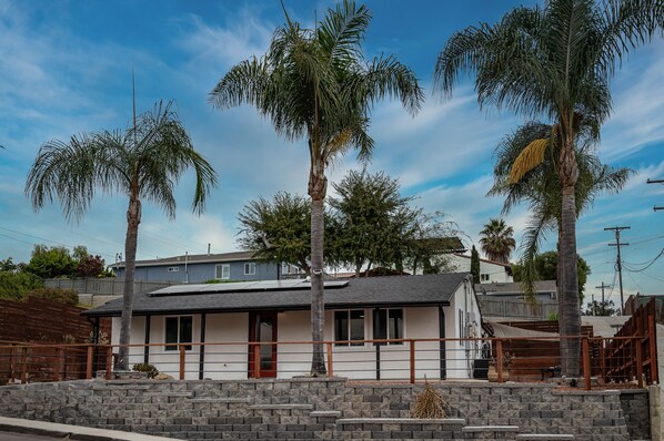 The front of the house features a welcoming atmosphere as you arrive