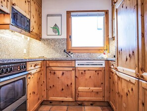 Cabinetry, Wood, Building, Interior Design, Floor, Kitchen, Flooring, Wall, Wood Stain, Countertop
