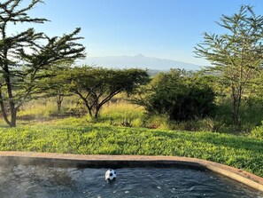 Relax and Rejuvenate in the Hot tub with a stunning view of Mount Kenya