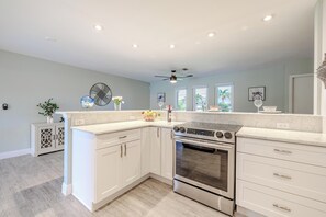 Culinary Charm - - Cook with ease in this modern kitchen featuring plenty of counter space & functional appliances
- Bright &  airy, it’s designed to inspire creativity & enjoyable meal preparation
- Perfect for whipping up family favorites or trying out new recipes