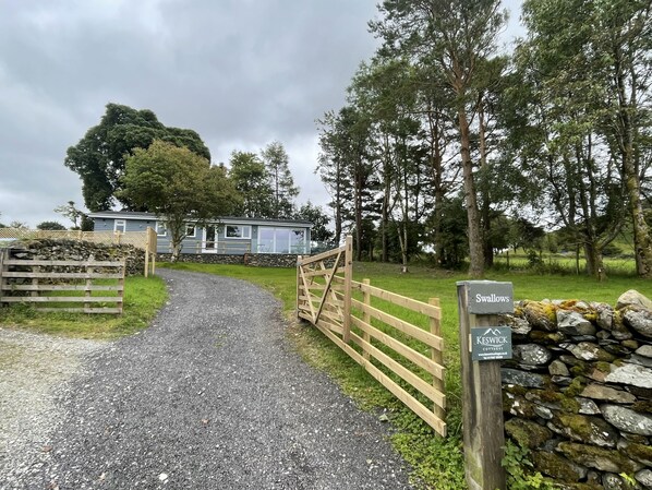 Follow the private drive from the road to Swallows Lodge