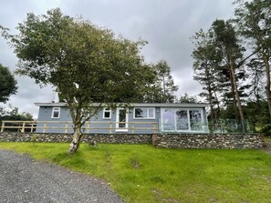 The front entrance to the lodge and a beautiful al fresco dining area for the sunny days