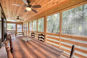 Enjoy the back deck on a hot day while sitting under the ceiling fan.