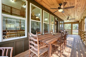Back deck table that seats comfortably.