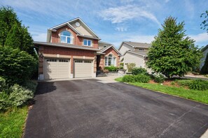 Gorgeous front entrance and 4 car driveway for parking