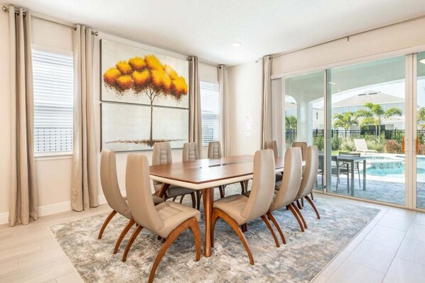 Large dining table with seating for up to 8 people
