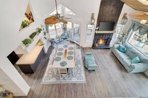 The open floor plan seamlessly connects the dining and living areas, perfect for gatherings.