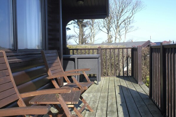 Decked terrace with garden chairs
