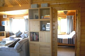 Sitting area with book shelves and local information leaflets