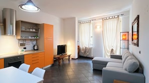 Large living room with modern kitchen