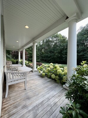 West-facing, deep front Porch overlooks front yard & invites you to relax!