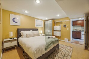 Bedroom 1 with a new queen size bed and TV.