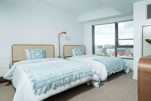 Second bedroom with TV and 2 Queen/Full luxury beds