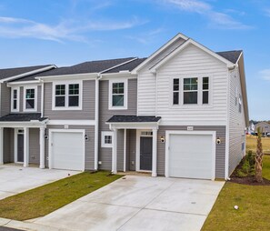 End unit with side lot for activities 