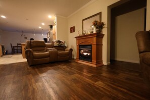 Cozy up by the fireplace in our Hocking Hills cabin—perfect for relaxing evenings and family moments