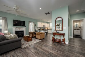 Open concept living room with queen pull out sofa