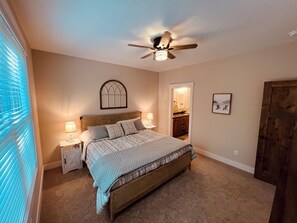 Master bedroom with king bed and 3/4 bath en suite.