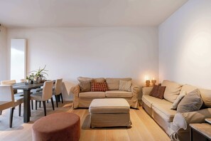 Bright and modern living area with direct access to the balcony