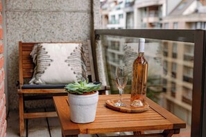Sunny balcony with lateral sea view