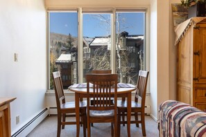 Dining area for four; perfect for enjoying intimate dinners or fun game nights!