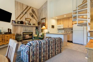 Enjoy an open layout that seamlessly connects the living, dining, and kitchen areas for effortless entertaining and relaxation.