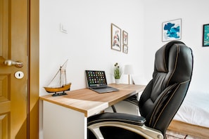 Your private workspace with a comfy chair and plenty of inspiration. Wondering about Wi-Fi speed? Let us know!