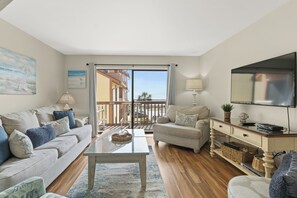 Large living room with lots of seating and beautiful views