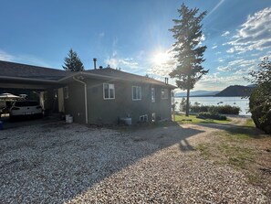 Gravel driveway up to the back parking lot