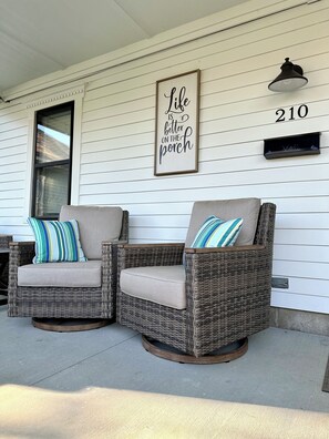Unwind with a cup of coffee on the relaxing front porch.