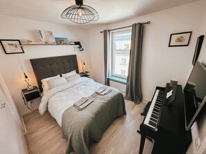 Cozy double bed in the bedroom