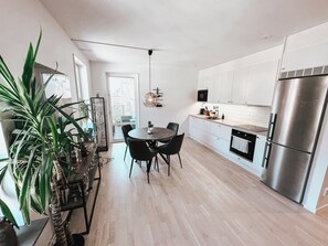 Full kitchen and a social dining area