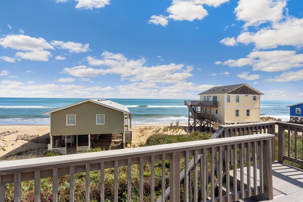 This delightful property offers stunning ocean views, comfortable accommodations, and a prime location just steps from the beach.