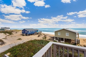 This delightful property offers stunning ocean views, comfortable accommodations, and a prime location just steps from the beach.