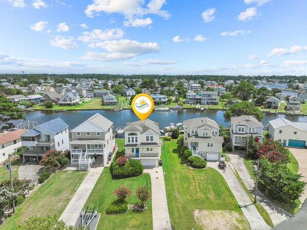 Get ready to experience a carefree existence at this waterfront 4-Bedroom, 4-Bathroom escape in Colington Harbor.